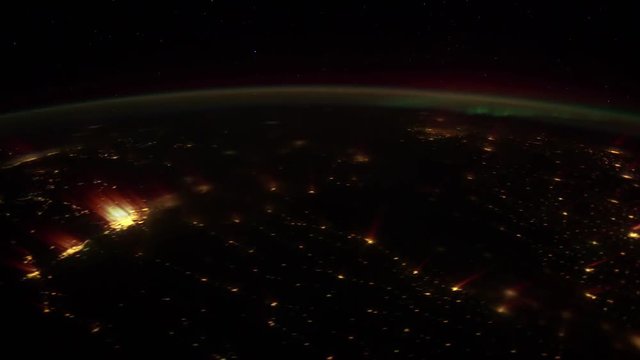 Planet Earth from flying satellite at night