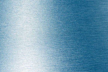 Abstract blue metallic background with gradient, texture closeup