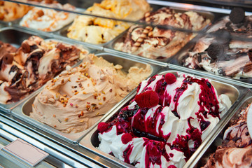 Ice cream in Rome, Italy. Italian gelateria. Ice-cream cafe, show window with sweeties. - obrazy, fototapety, plakaty