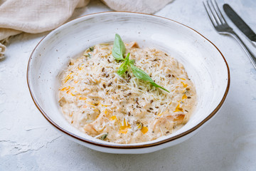 risotto with porcini mushrooms on white plate