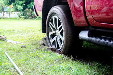 Thailand, February 28, 2562 : Tire mired Close up.Soil that causes the car to cause an accident.
