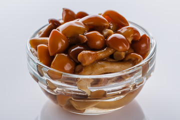 pickled vegetables on a white acrylic background