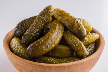 pickled vegetables on a white acrylic background
