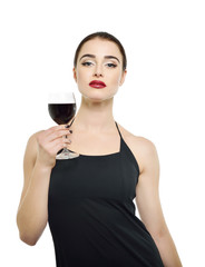 Young attractive woman holding glass of red wine. Pretty lady drinks alcoholic drink
