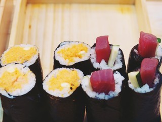 Japanese food Sushi roll in wood box background