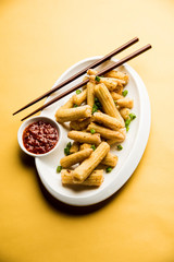 Baby Corn Manchurian dry - popular Indo-chinese starter recipe. selective focus