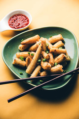 Baby Corn Manchurian dry - popular Indo-chinese starter recipe. selective focus
