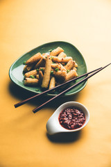 Baby Corn Manchurian dry - popular Indo-chinese starter recipe. selective focus
