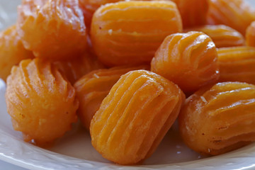 White plate tulumba dessert