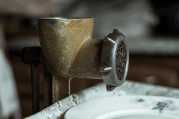 Vintage iron meat grinder. The old meat grinder of the Soviet era
