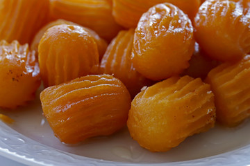 White plate tulumba dessert