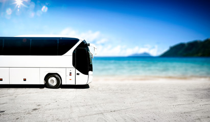 White summer car on beach and blue sky. Sea landscape and free space for your decoration. 