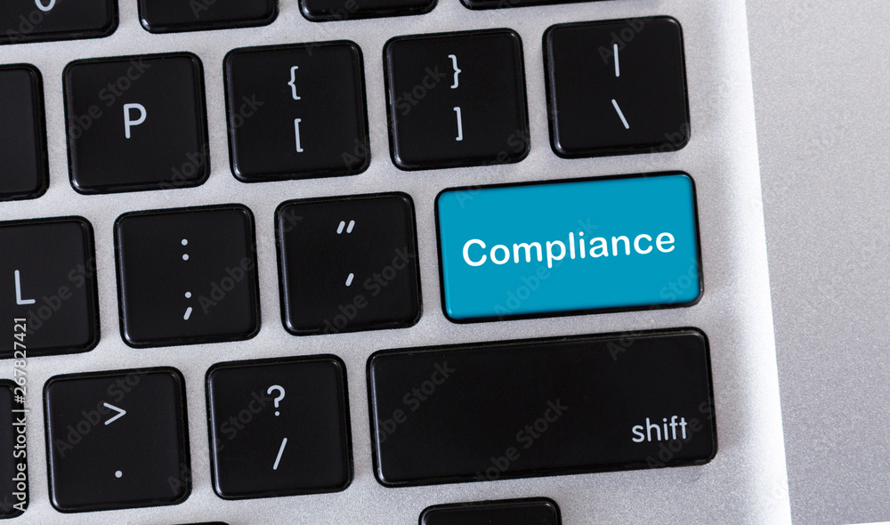 Poster blue button with text compliance on keyboard