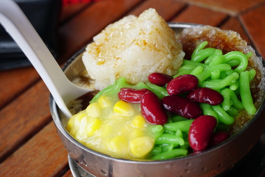 Cendol Desert. Asian favourite iced dessert of rice flour and pandanus jelly with coconut milk and palm sugar