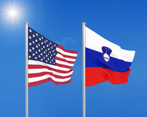 United States of America vs Slovenia. Thick colored silky flags of America and Slovenia. 3D illustration on sky background. - Illustration