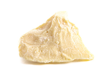 Chunks of Raw Organic Cocoa Butter on a White Background