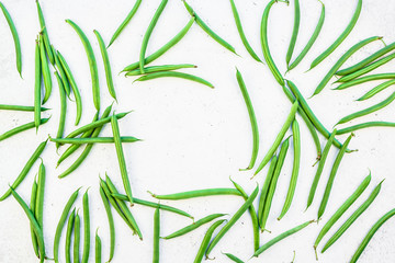 Fototapeta premium Top view of fresh green beans background