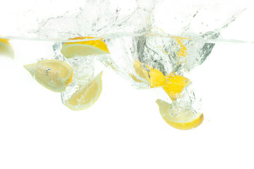 Fototapeta na wymiar Cut lemon under the water