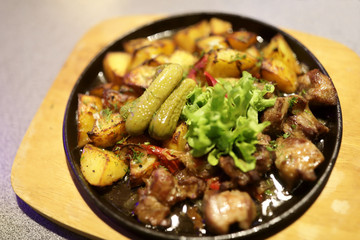 Fried pork with potatoes