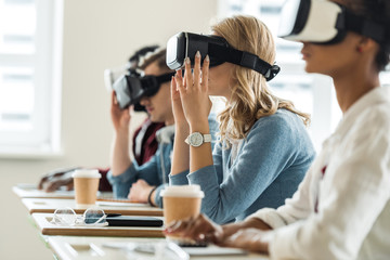 Group of people using VR headsets