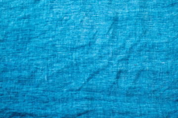 The texture of the linen fabric blue, blue crumpled linen texture
