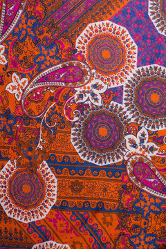 paisley pattern textiles red-brown color fabric texture