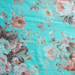 Fototapeta na wymiar sea-green fabric with rose flowers, fabric texture