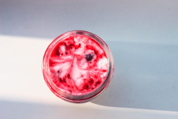 homemade yogurt mixed with jam top view