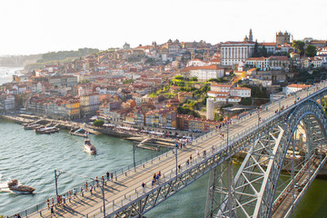 Obraz premium Aerial view of Dom Luis I Bridge across Douro River, the famous postcard of Porto, Portugal