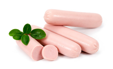 Raw meat sausages with greens. Isolated on white background