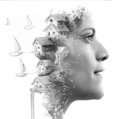 Paintography. Double exposure close up of a woman combined with hand drawn painting of sailboats docked outside of houses in midair