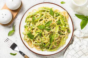 Pasta spaghetti with zucchini top view.