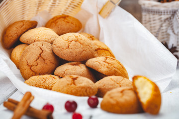 Homemade tangerine cookies on wooden rustic table. Close up