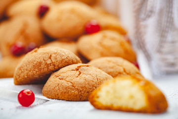 Homemade tangerine cookies on wooden rustic table. Close up