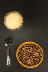 Fresh coffee and retro alarm clock. Concept of getting up to work. Morning awakening.