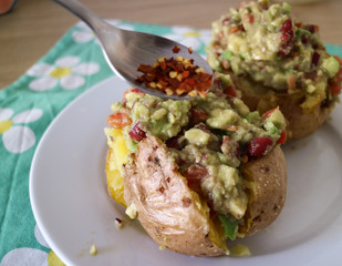 Stuffed potato with guacamole/ Baked potato with avocado cream, chilly and beans
