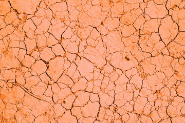 Orange сracks texture ground surface soil, drought, dried clay,  ground on Mars