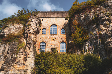 Fototapeta na wymiar Old architecture between natural rocks in Luxembourg city old town