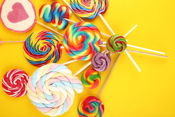 lolly candies with sugar. colorful array of childs lollipops sweets and treats with candy