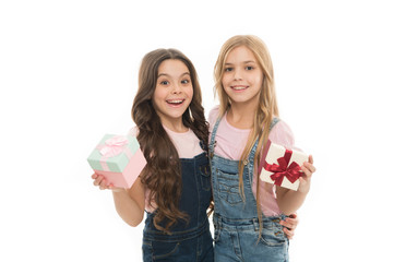 Girls open holiday present. Children cheerful hold presents. Opening gifts. Perfect present for teens. Shopping day. Birthday present. For my dear friend. Girls sisters or friends hold gift boxes