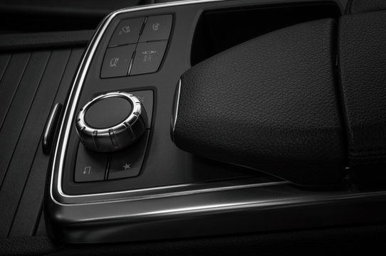 Dashboard control buttons in modern car.