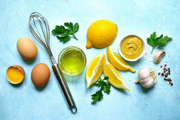 Ingredients for making homemade natural mayonnaise sauce.Top view with copy space.