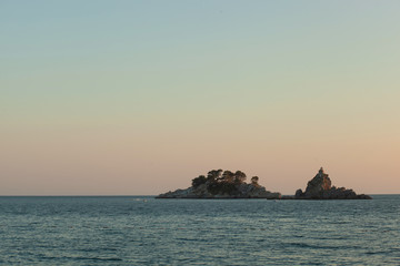 Sunset in City Petrovac, Montenegro. View on island in sea