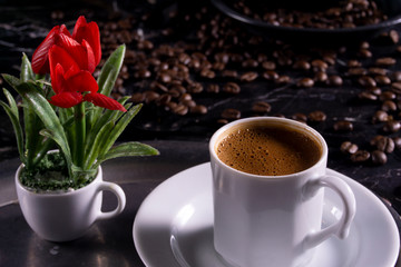 turkish coffee and coffee beans on black marble