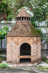 Hong Kong, China - March 8, 2019: Tung Shan Temple in Wing Ping Tsuen Neighborhood. Brown brick...