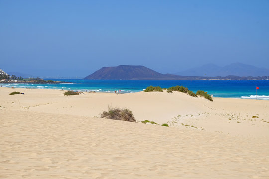 Sand Dunes and beach in National Park Corralejo, Fuerteventura.