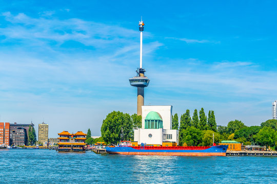 Floating Chinese Restaurant In Front Of Euromast Tower In Rotterdam, Netherlands