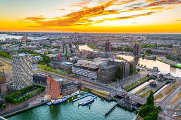 Foto op Plexiglas Sunset aerial view of Port of Rotterdam, Netherlands © dudlajzov