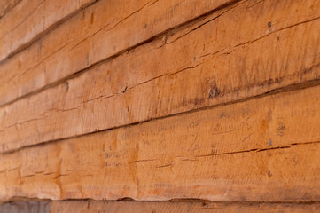 Wall, under construction of a house from a wooden bar, close-up, shallow depth of field