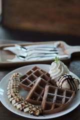 Homemade Belgian waffles with with bananas and ice cream